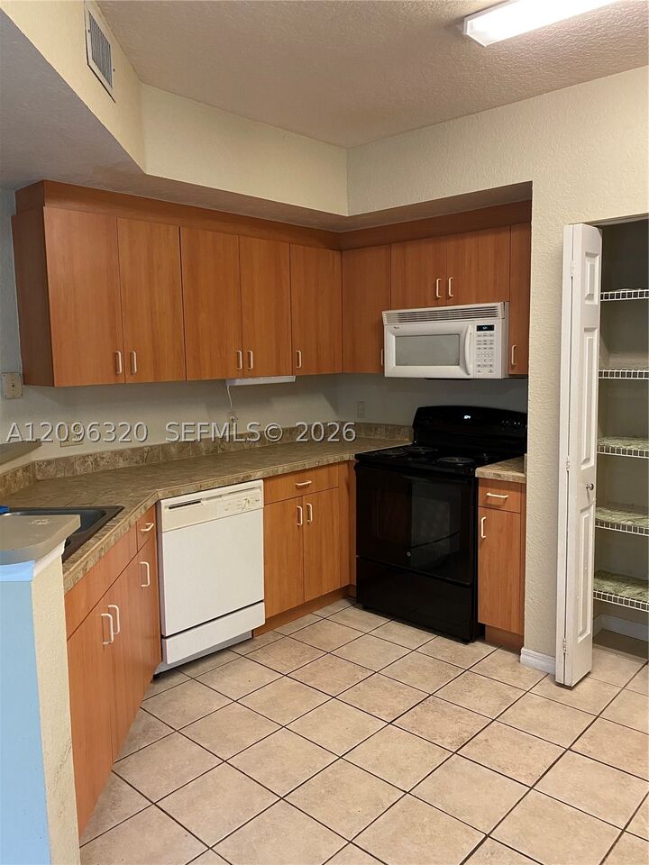 Property Photo:  307 Belmont Ln  FL 33068 