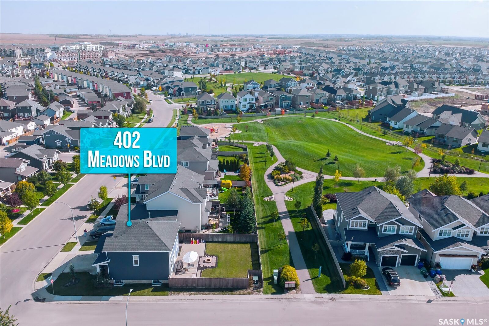 Property Photo:  402 Meadows Boulevard  SK S7V 0E7 