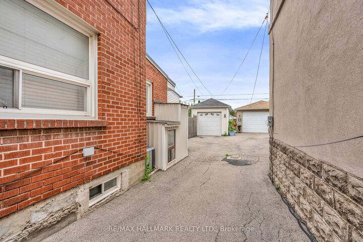 Property Photo:  65 Kirknewton Road  ON M6E 3X9 