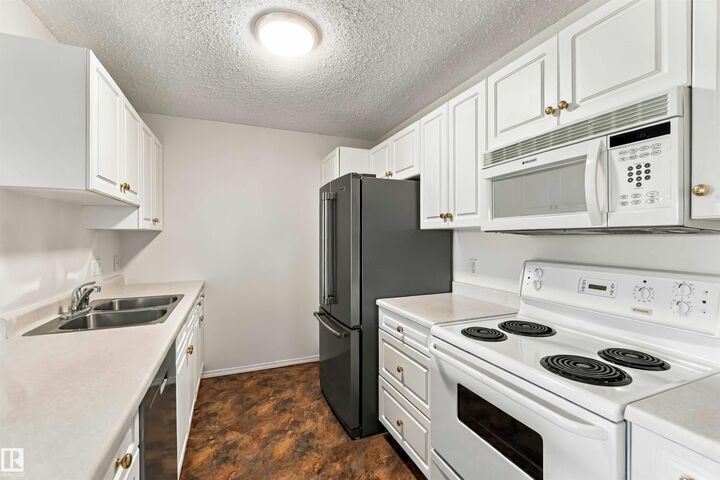 Property Photo: 10511 42 Avenue NW 205 AB T6J 7G8