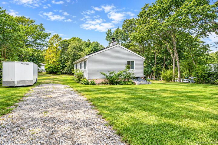 Property Photo: 95 W Bartlett Road NY 11953
