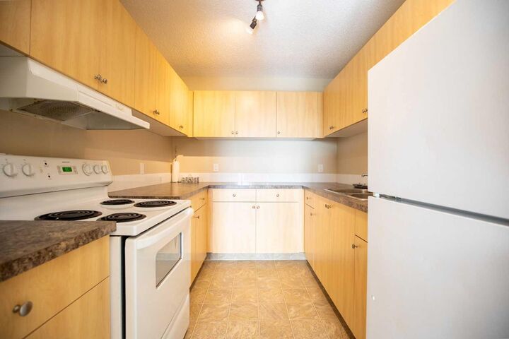 Property Photo:  9903 97 Street 304  AB T0H 3C0 