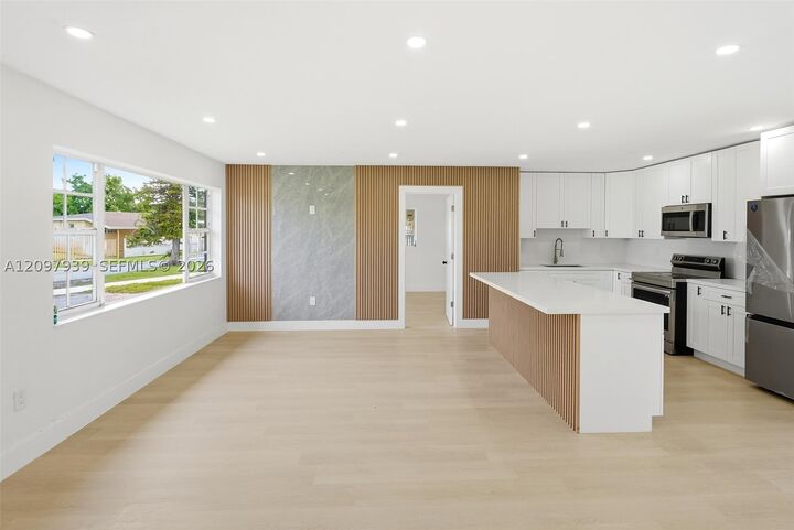 Property Photo:  701 NW 176th Ter  FL 33169 