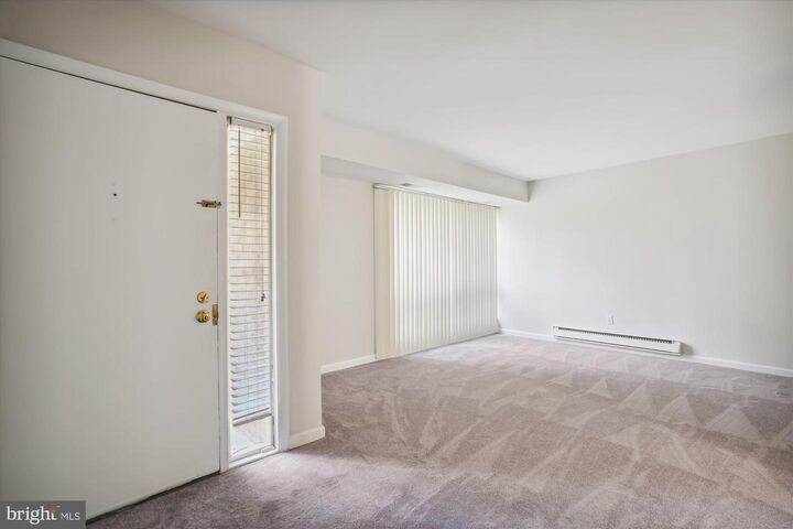 Property Photo:  8857 Tamebird Court E T27  MD 21045 