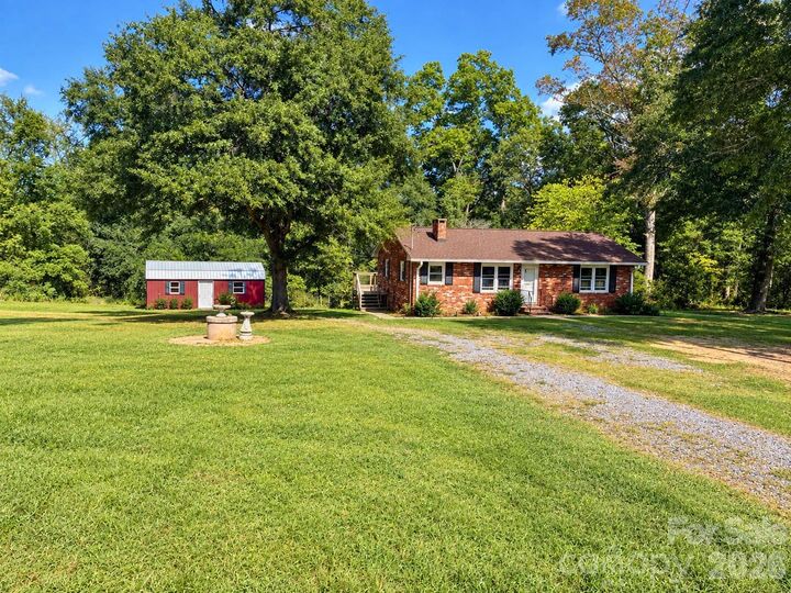 Property Photo: 697 Island Ford Road NC 28043