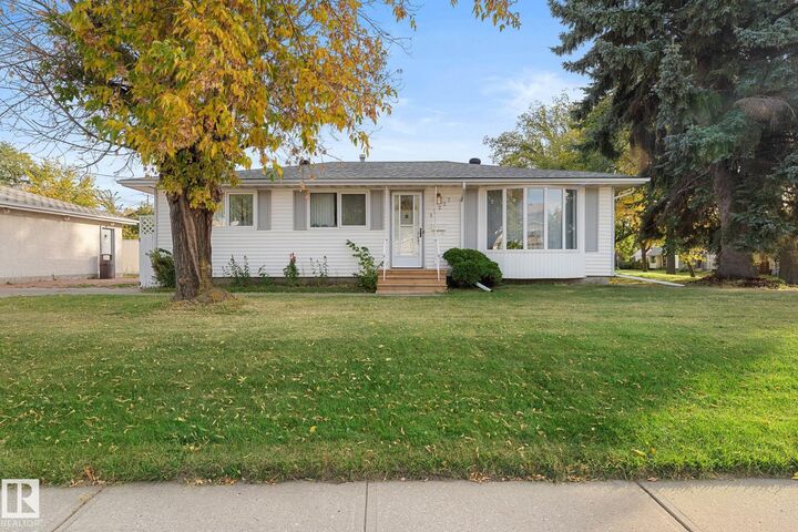 Property Photo:  12227 58 Street NW  AB T5W 3X6 