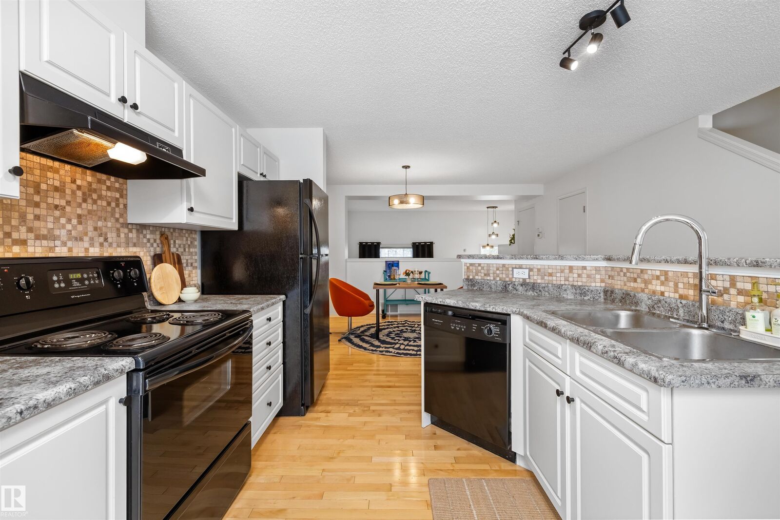 Property Photo:  8304 11 Avenue SW 83  AB T6X 1J8 