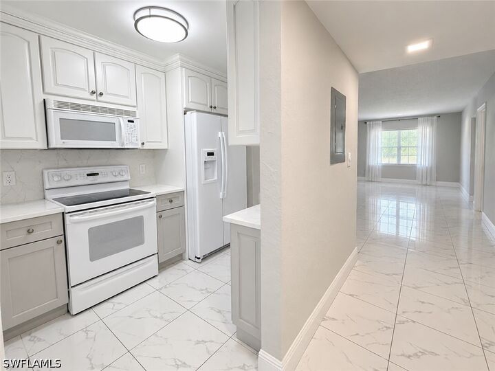 Property Photo:  501 Forest Lakes Boulevard 212  FL 34105 