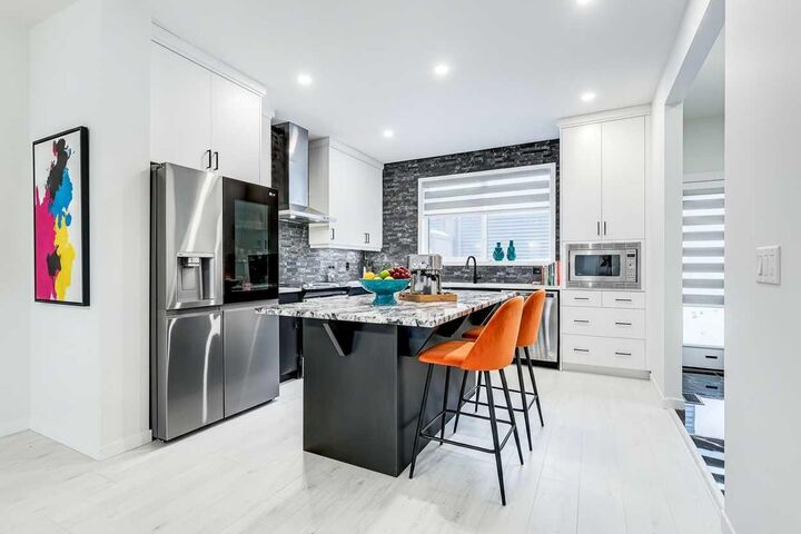 Property Photo:  184 Rowmont Boulevard NW  AB T3L 0H3 