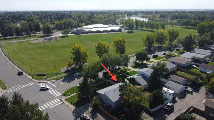 Property Photo:  205 Columbia Boulevard W  AB T1K 3Z5 