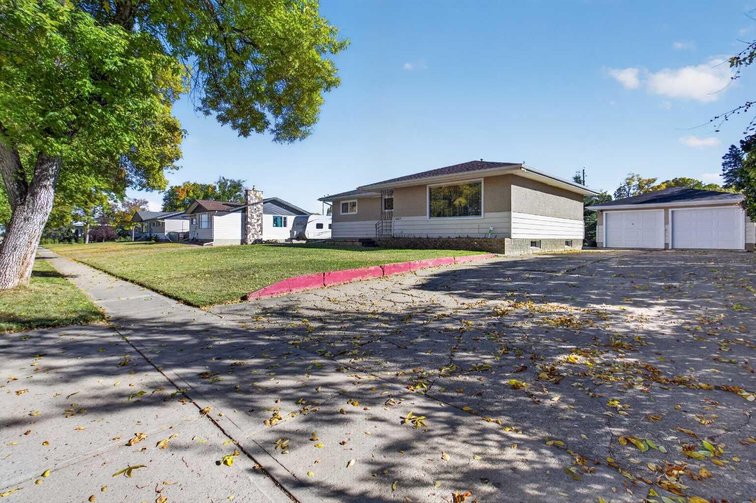 Property Photo:  5205 56 St  AB T4V 2E2 