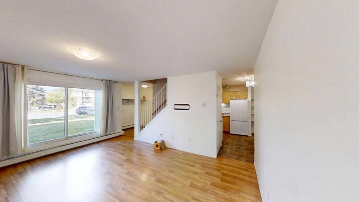 Property Photo:  7201 Poplar Drive 3110  AB T8V 6C5 