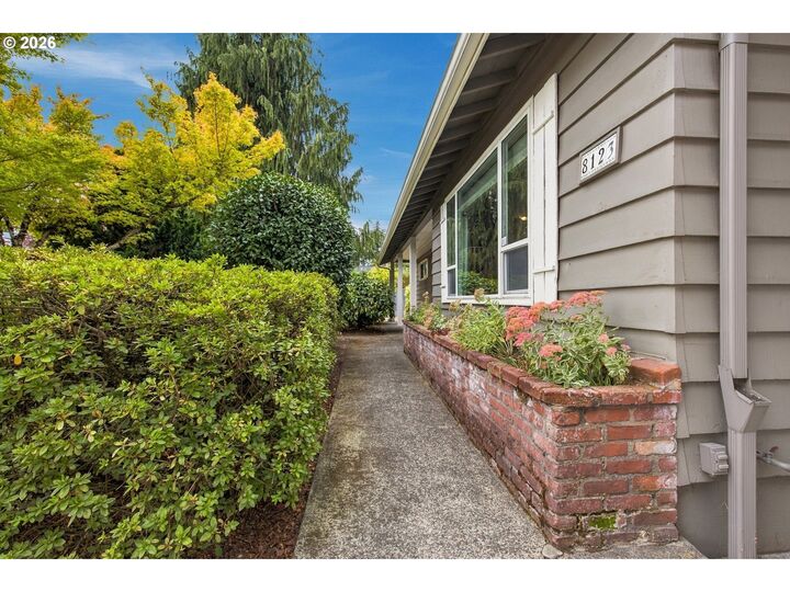 Property Photo:  8123 SE Roots Rd  OR 97267 