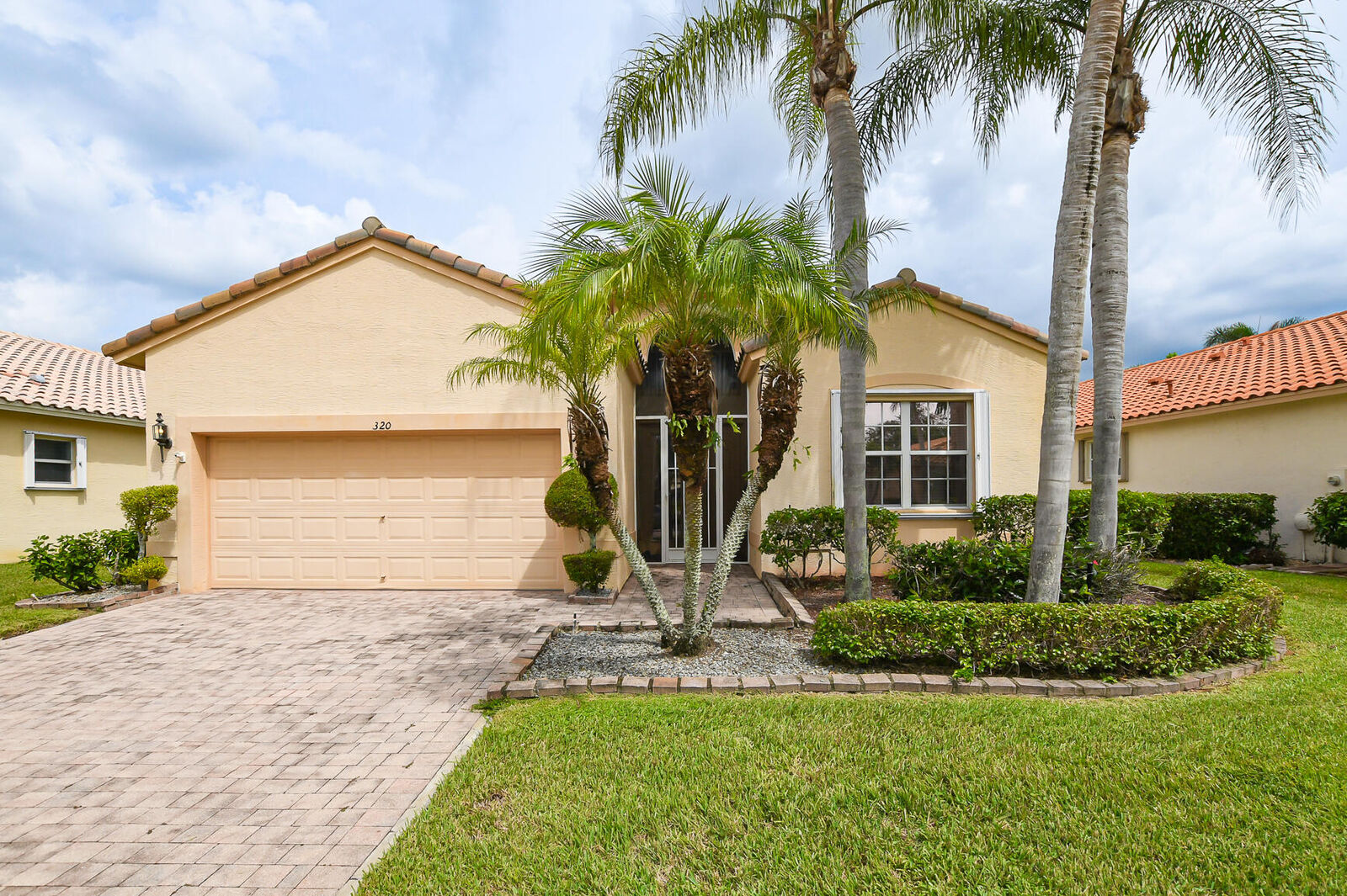 Property Photo: 320 NW Millpond Lane FL 34986