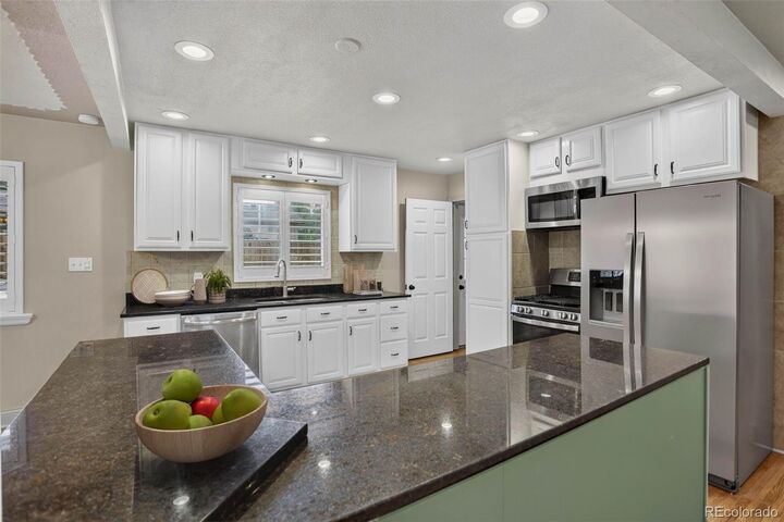 Property Photo:  6422 Independence Street  CO 80004 