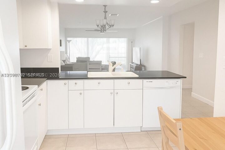 Property Photo:  6530 NW 98th Ter B25  FL 33321 