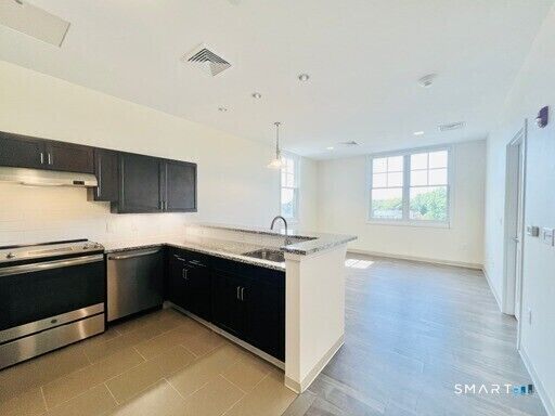 Property Photo: 215 Stillwater Avenue 216 CT 06902