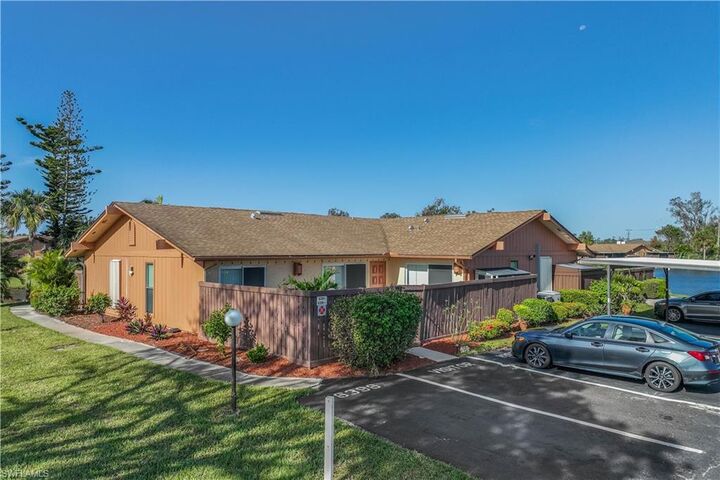 Property Photo: 6394 Royal Woods Dr FL 33908