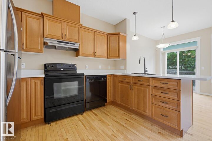 Property Photo:  11612 11 Av SW  AB T6W 1W8 