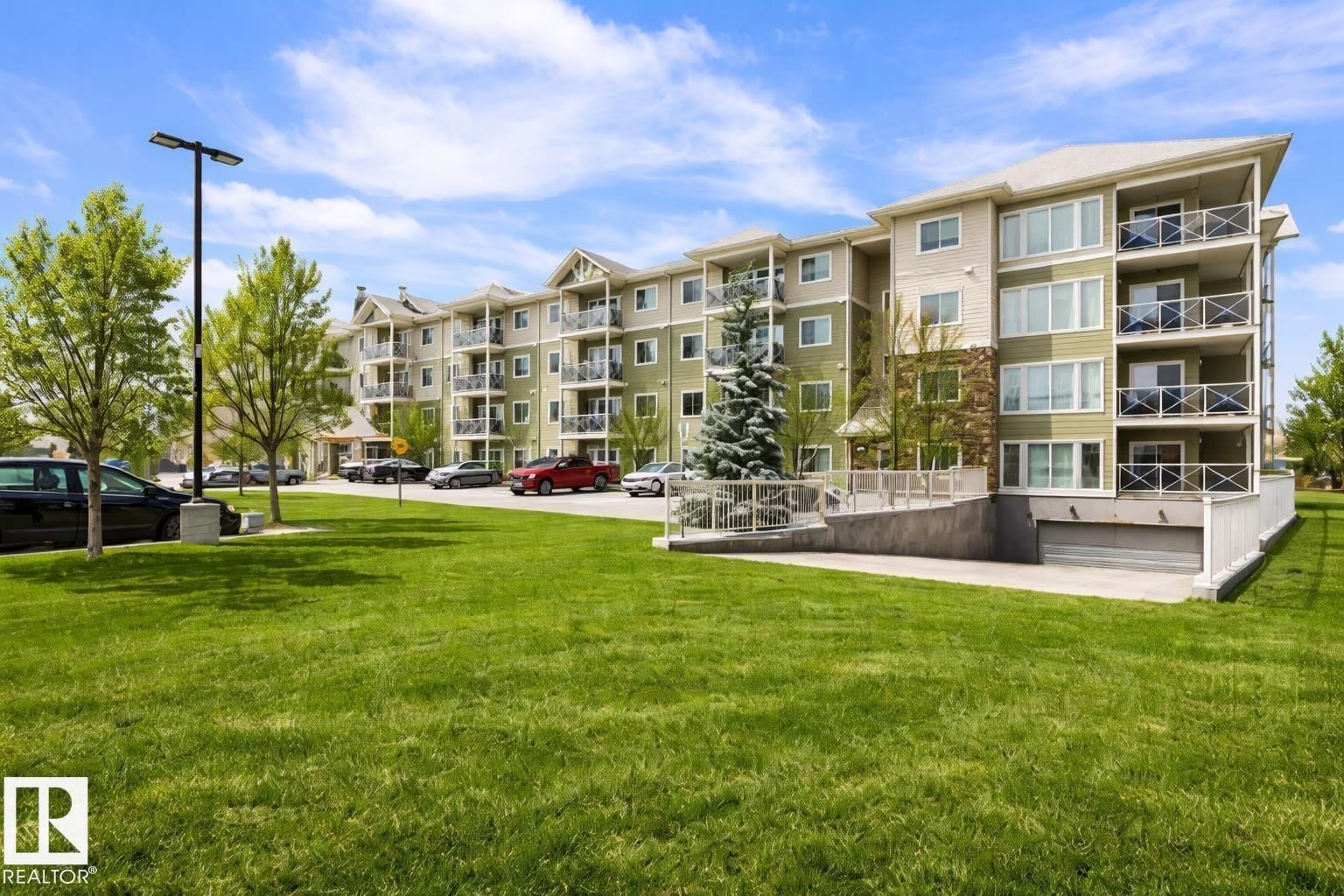 Property Photo:  12660 142 Avenue NW 103  AB T5X 0J4 