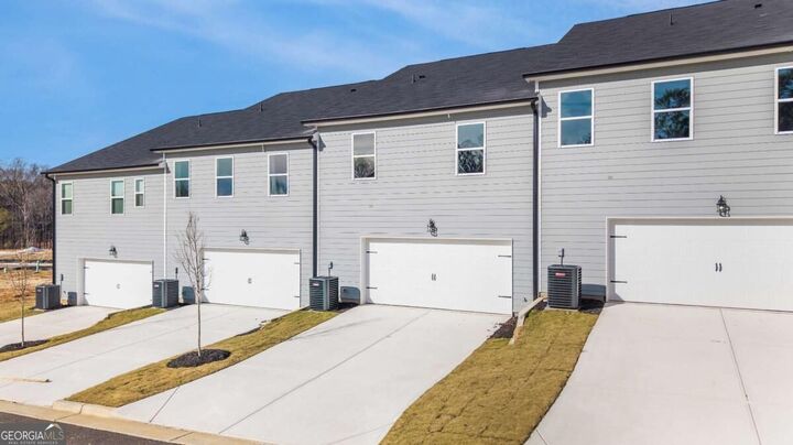 Property Photo: 401 Whitehorse Way 42 GA 30094