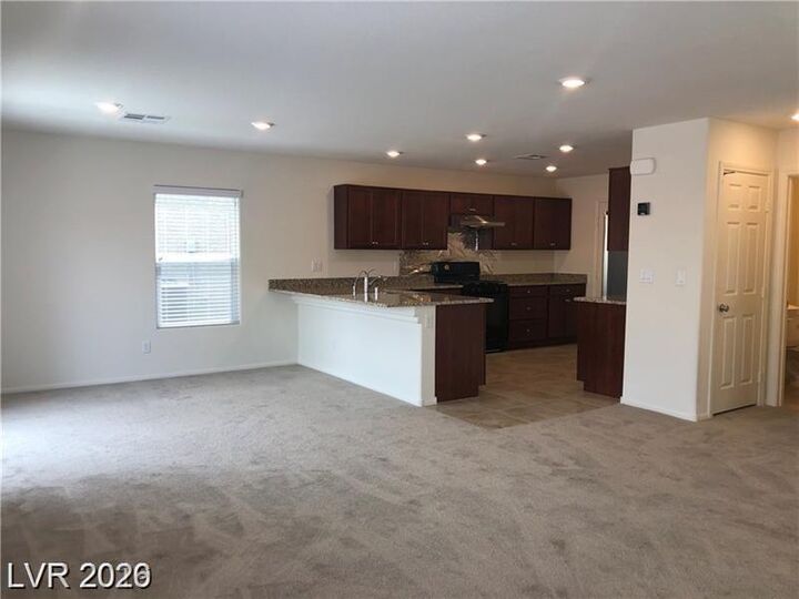 Property Photo:  7576 Slipper Orchid Street  NV 89148 