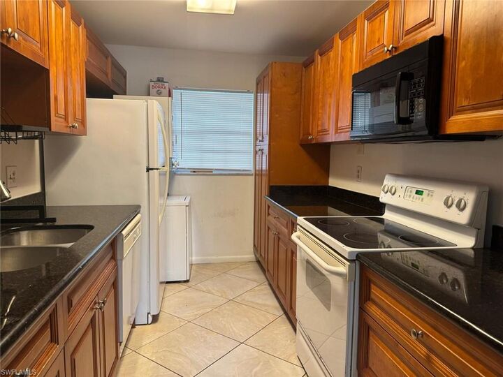 Property Photo:  4900 Biscayne Dr 21  FL 34112 