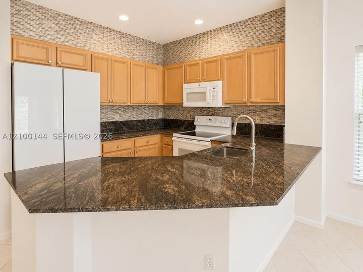 Property Photo:  7337 Smithbrooke Dr 7337  FL 33467 
