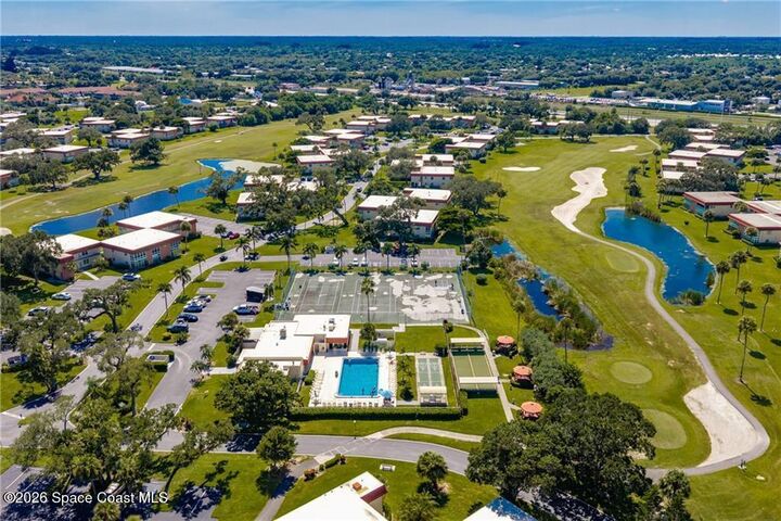 Property Photo: 99 Springlake Drive FL 32962