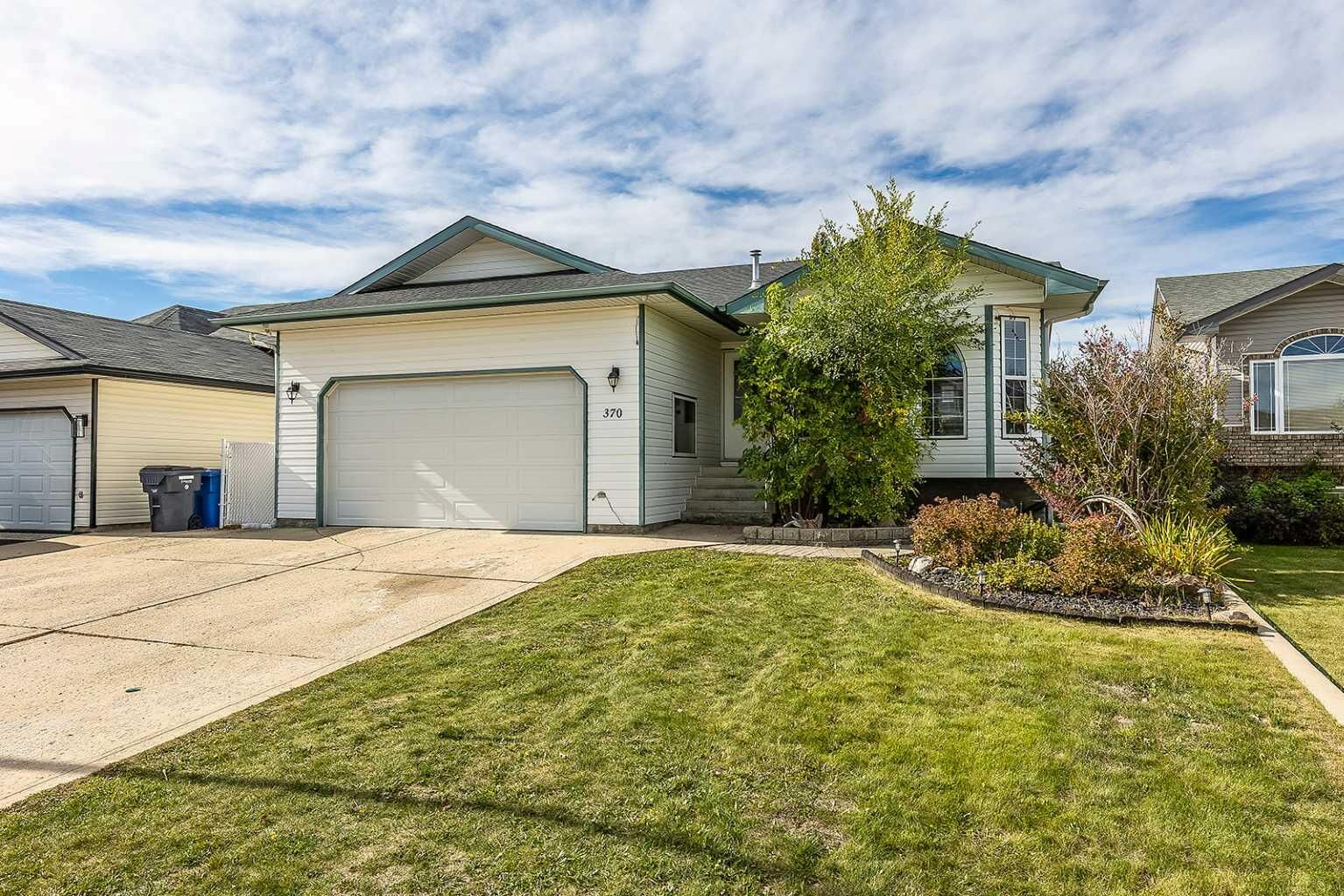 Property Photo:  370 Stratton Way SE  AB T1B 4M9 