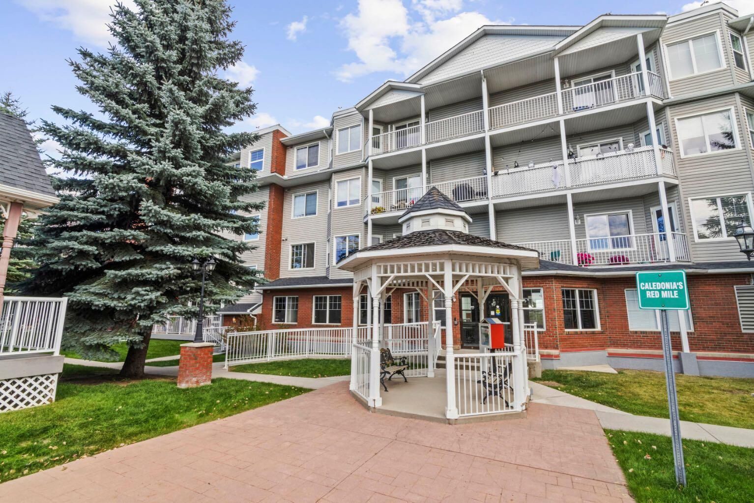 Property Photo:  8 Prestwick Pond Terrace SE 409  AB T2Z 4P3 