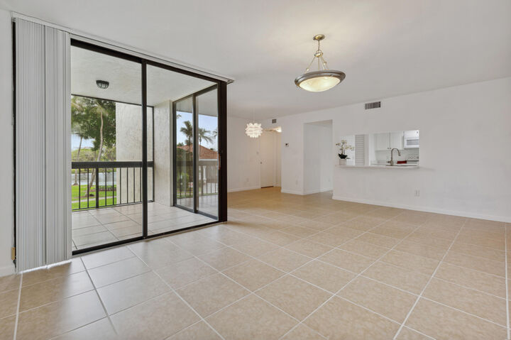Property Photo:  2025 Lavers Circle D204  FL 33444 