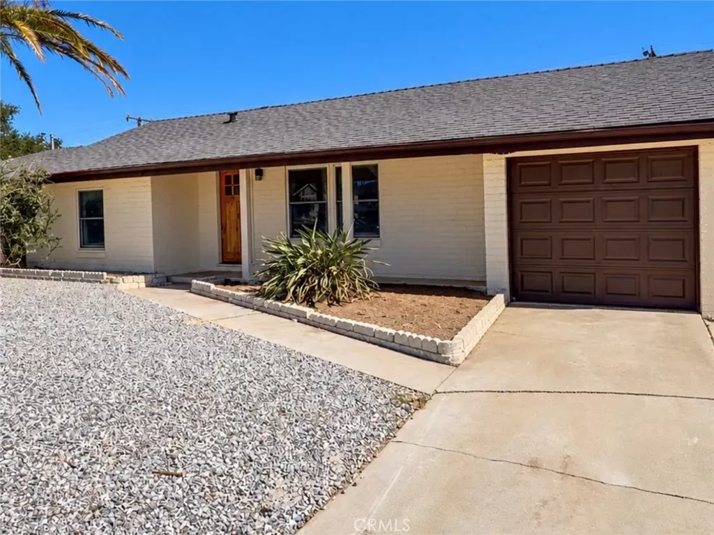 Property Photo:  8627 Kempster Ave  CA 92335 
