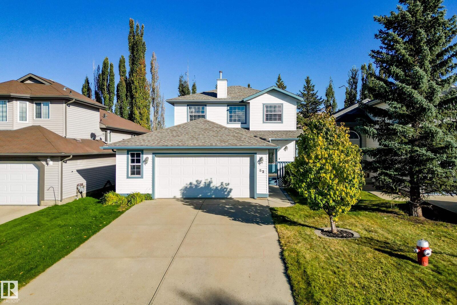 Property Photo:  52 Harmony Crescent  AB T7Z 2S3 