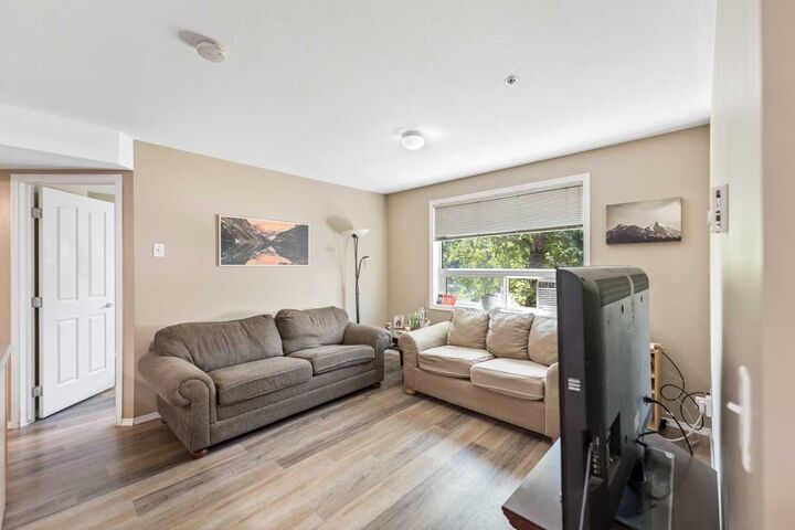Property Photo:  180 Kananaskis Way 117  AB T1W 3C6 