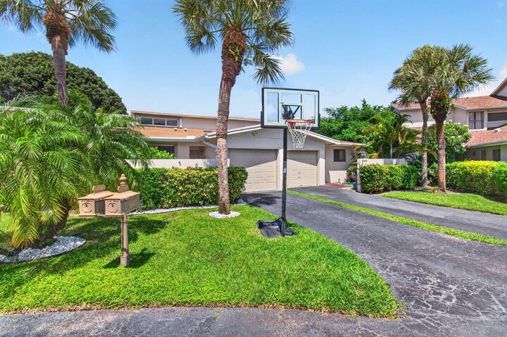 Property Photo:  6391 Toulon Drive  FL 33433 