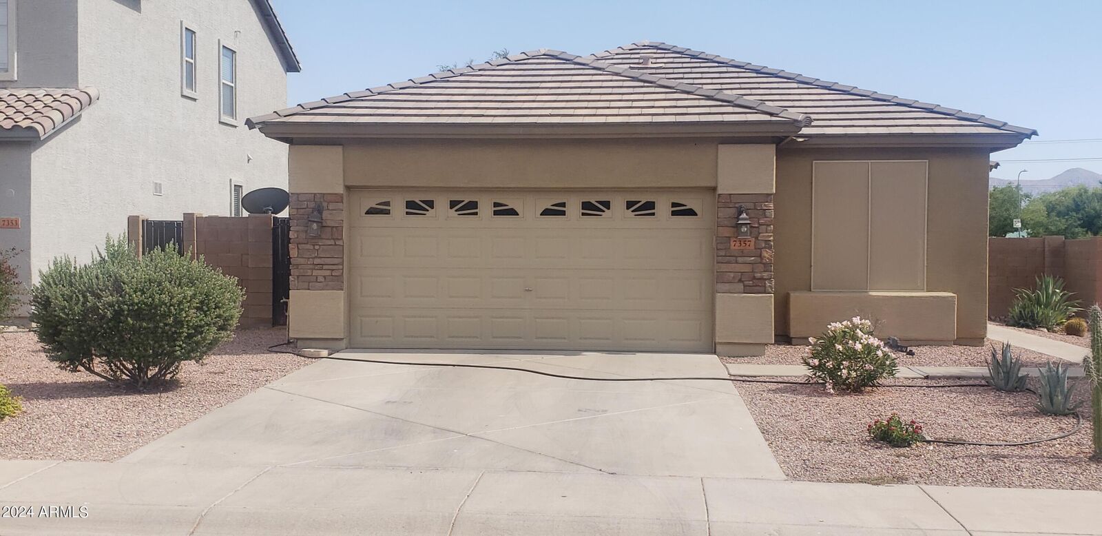 Property Photo: 7357 W Valencia Drive AZ 85339