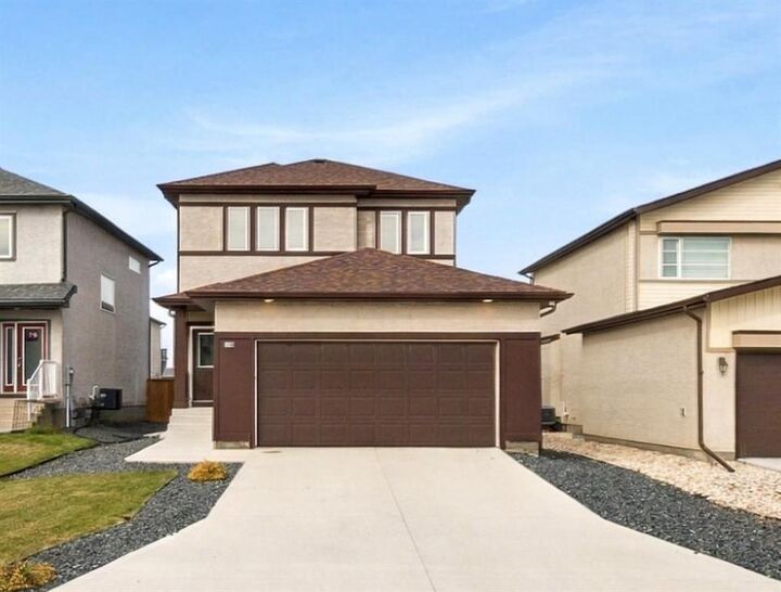 Property Photo: 114 Hughes Crescent MB R3Y 2B8