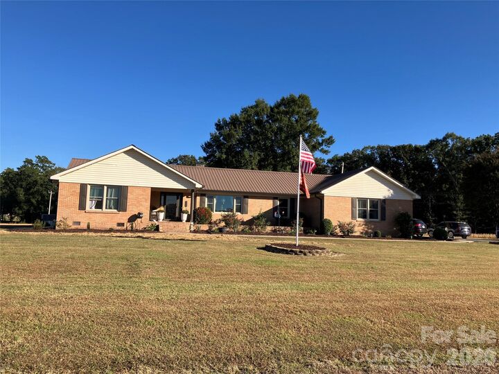 Property Photo:  902 Tomberlin Street  NC 28110 