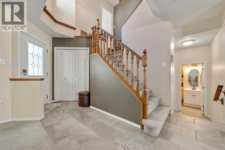 Property Photo:  27 Fairmont Garden Road South  AB T1K 7L2 