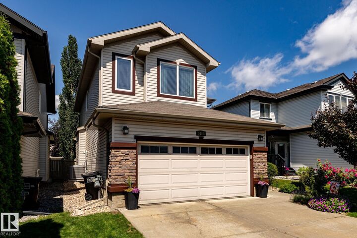 Property Photo:  5820 7 Avenue SW  AB T6X 0G6 