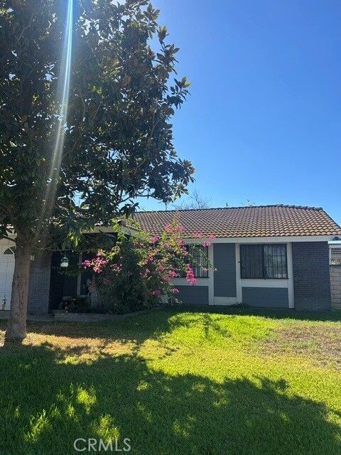 Property Photo:  9816 Bolton  CA 92503 