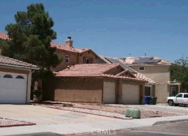Property Photo:  15290 Alexandria  CA 92301 