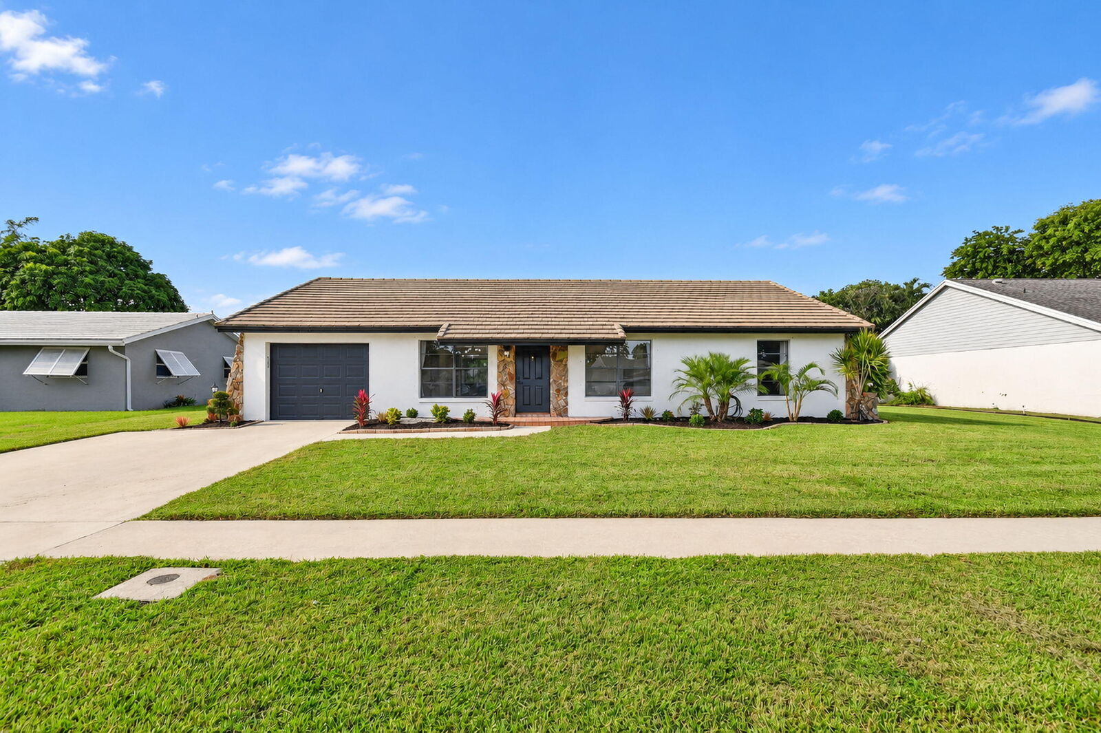 Property Photo: 8213 Rose Marie Avenue W FL 33472