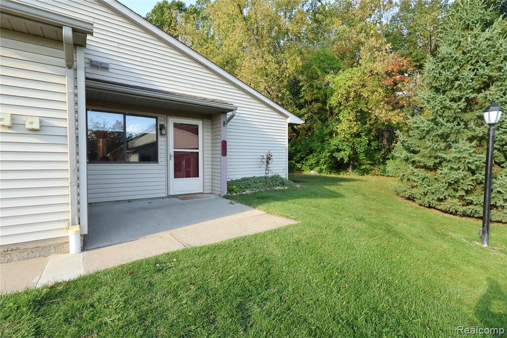 Property Photo:  313 Spring Brooke Drive  MI 48116 