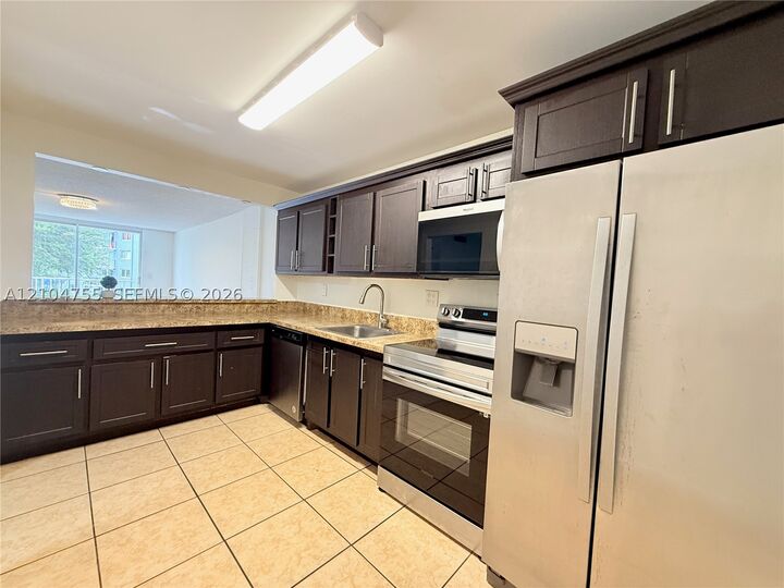 Property Photo:  1465 NE 123rd St 205  FL 33161 