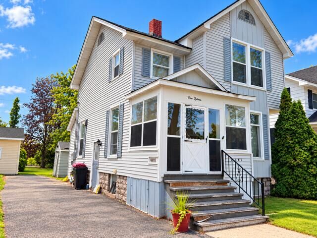 Property Photo:  115 E Lewis Street  MI 49707 