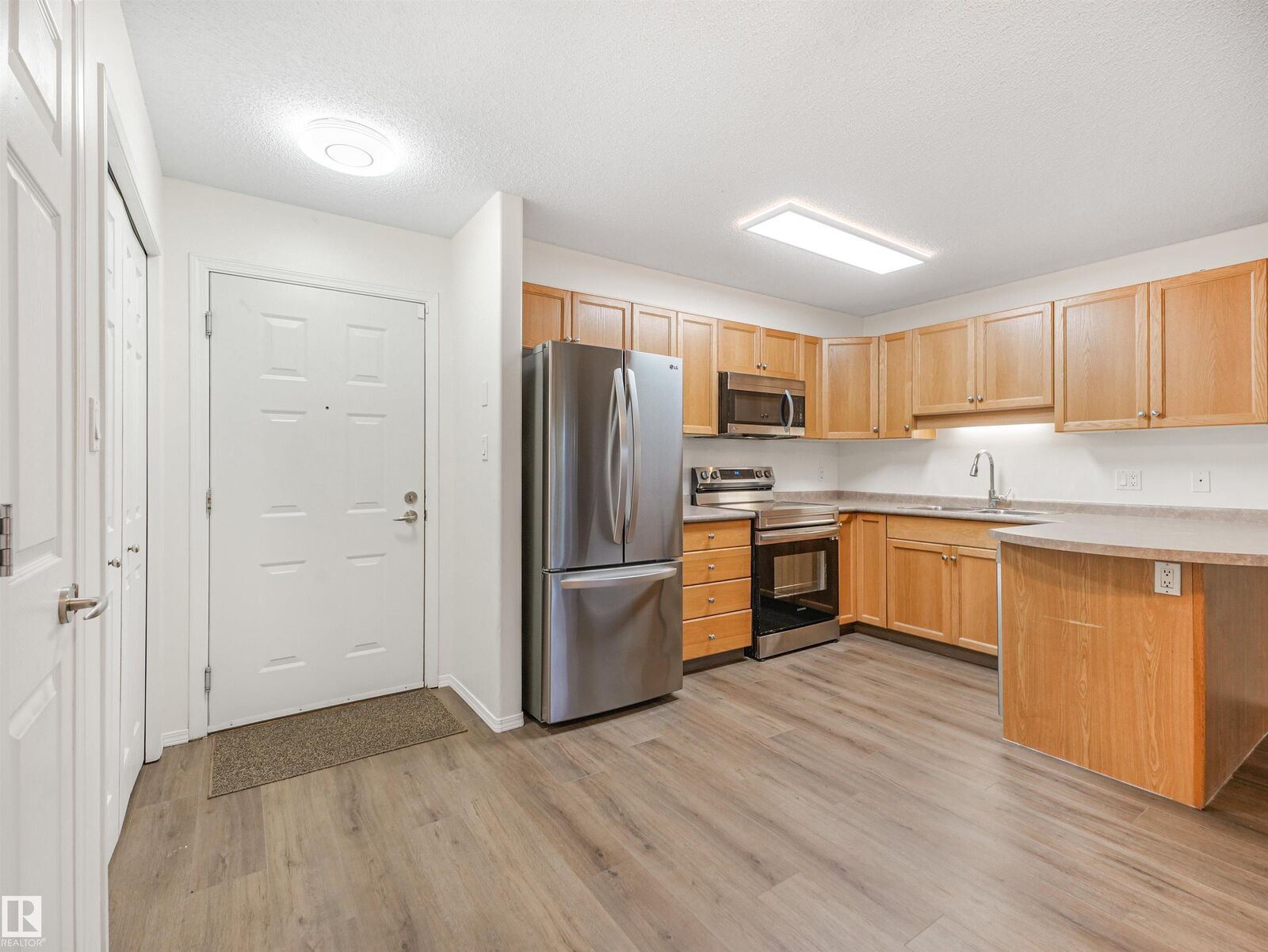 Property Photo:  13635 34 Street NW 112  AB T5A 0C4 
