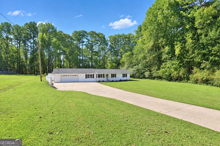 Property Photo: 220 E Crestwood Road GA 30290