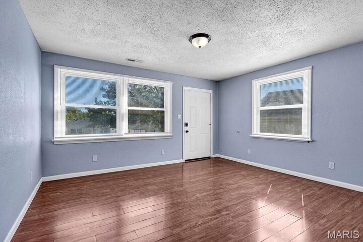 Property Photo:  1207 San Jacinto  MO 63139 